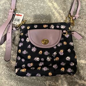 New with tags! Coach cross body purse.